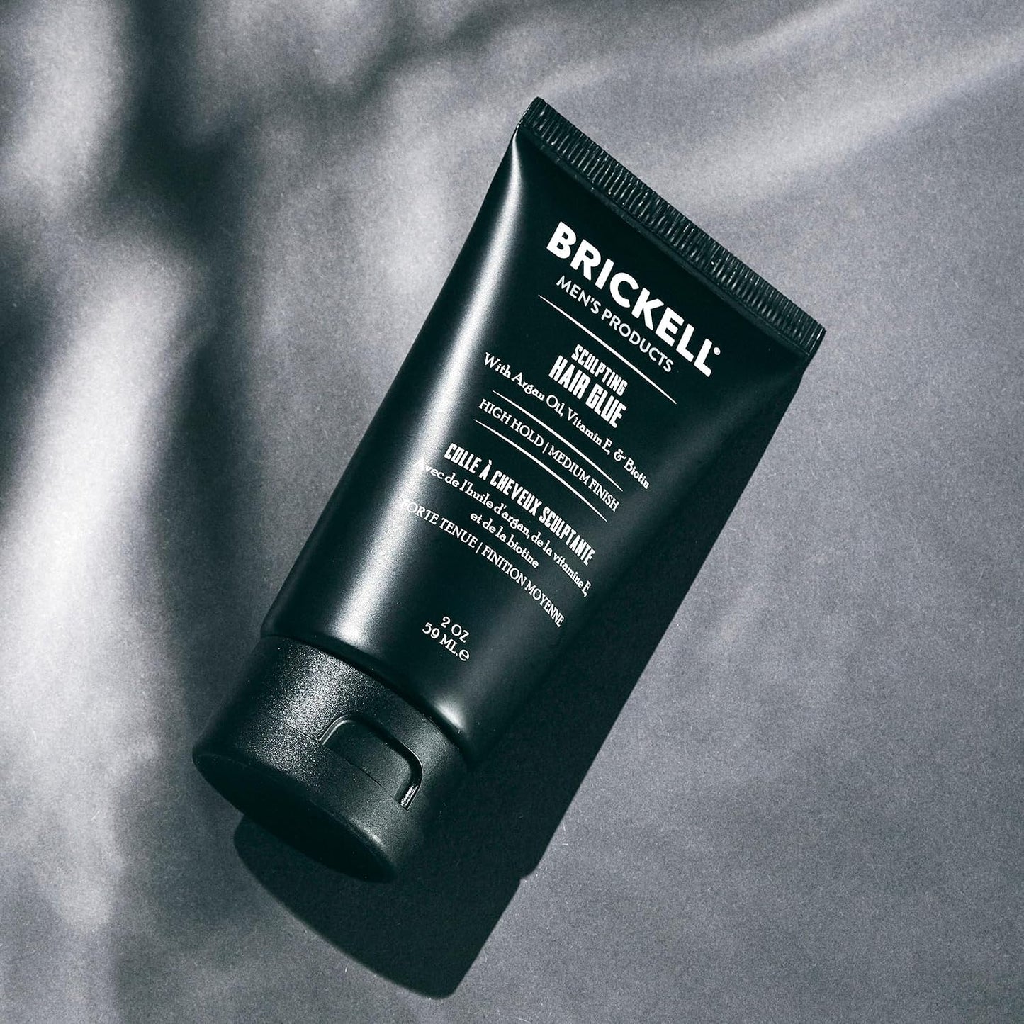 Brickell Men's Hair Styling Sculpting Hair Glue For Men, All Day Lasting Hold for Sculpting and Shaping Hair, With Argan Oil, Vitamin E, and Aloe, 2 Ounce, Scented